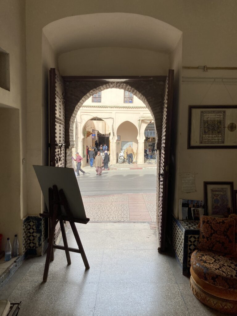 A view from inside the Musee De Meknes looking out towards Rue Dar Smen