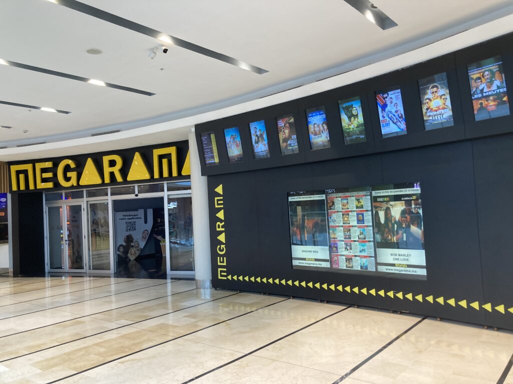 A view inside the Tanger City Center Mall showing the Megarama Theater