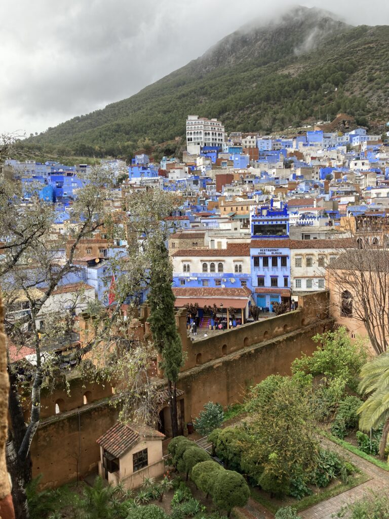 A view inside the courtyard of the Kasbah in Chefchaouen and the surrounding area