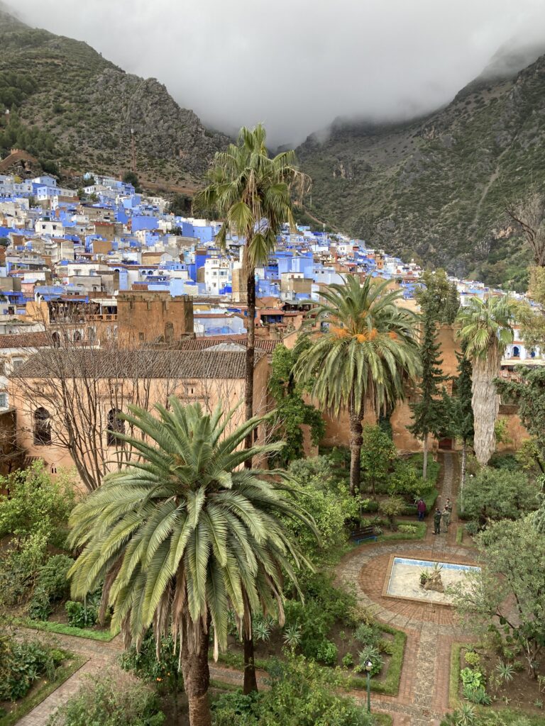 A view inside the courtyard of the Kasbah in Chefchaouen and the surrounding area