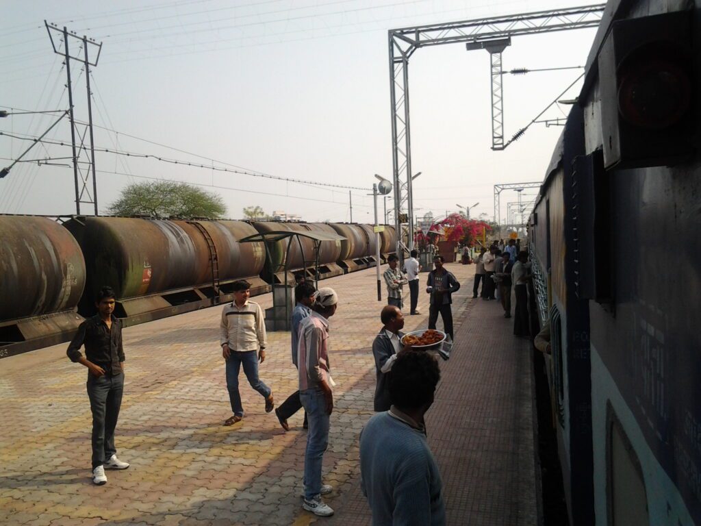 Vendor selling food at train stop in Sewagram, Maharashtra