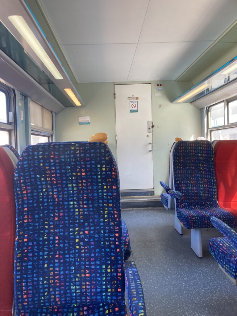 A view of a first class cabin on the ONCF train going from Casa Voyageurs to Casa Port station.