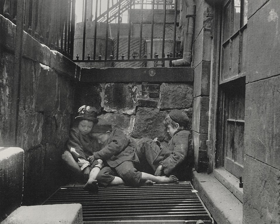 "Nomads of the Street", Street children in their sleeping quarters, New York. Before 1914. Jacob Riis (1849-1914)