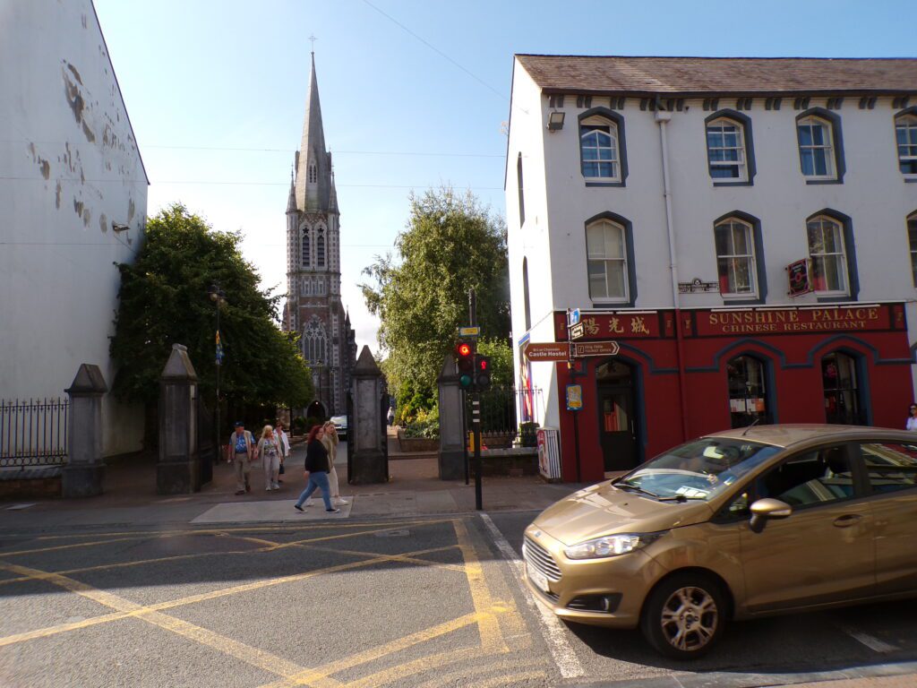 A scene in Tralee (Trá Lí) at the gate to St. John's Catholic Church