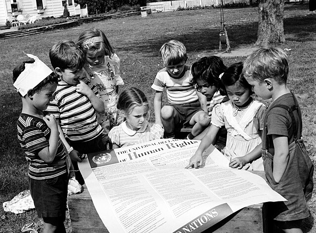 Children exploring Universal Declaration of Human Rights